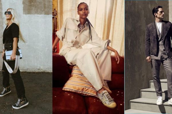 on a simple white Golden Goose tee and like gray trousers